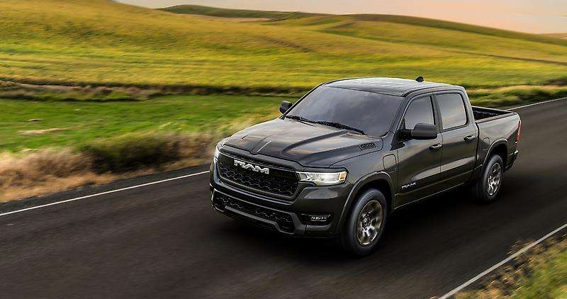 2026 RAM 1500 driving down the road