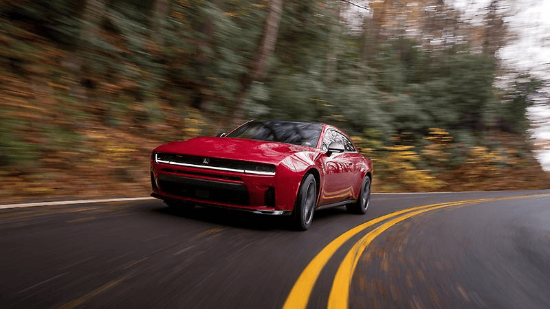 2027 Dodge Charger driving down the road